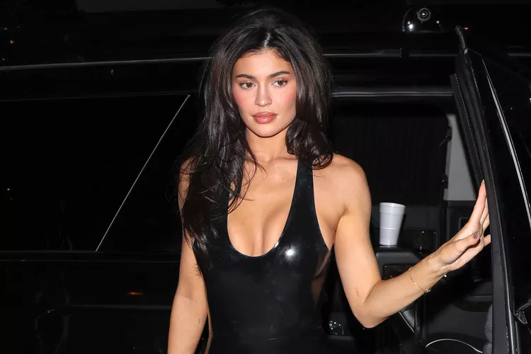 Kylie Jenner Rocks Plunging Latex Bodycon Dress and Sexy Big Hair Inspired by Her Sisters