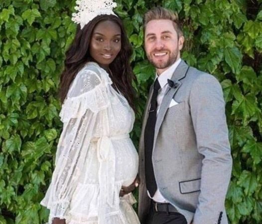 This dark-skinned, blue-eyed blonde model gave birth to a child – whose looks make their parents happy..